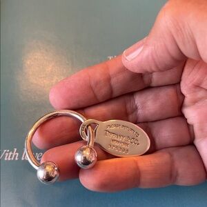 Tiffany & Co NY Authentic “Please Return To” Oval Tag Screwball Key Holder D2499